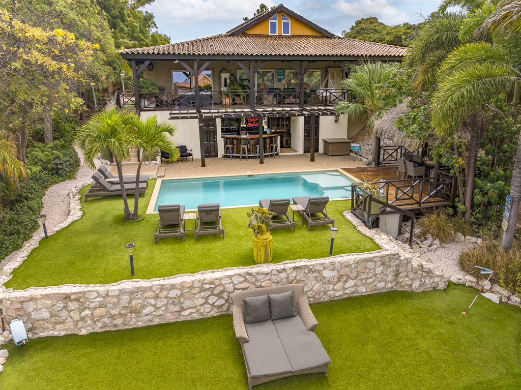 House, pool and garden viewed from above at Bayside Hill