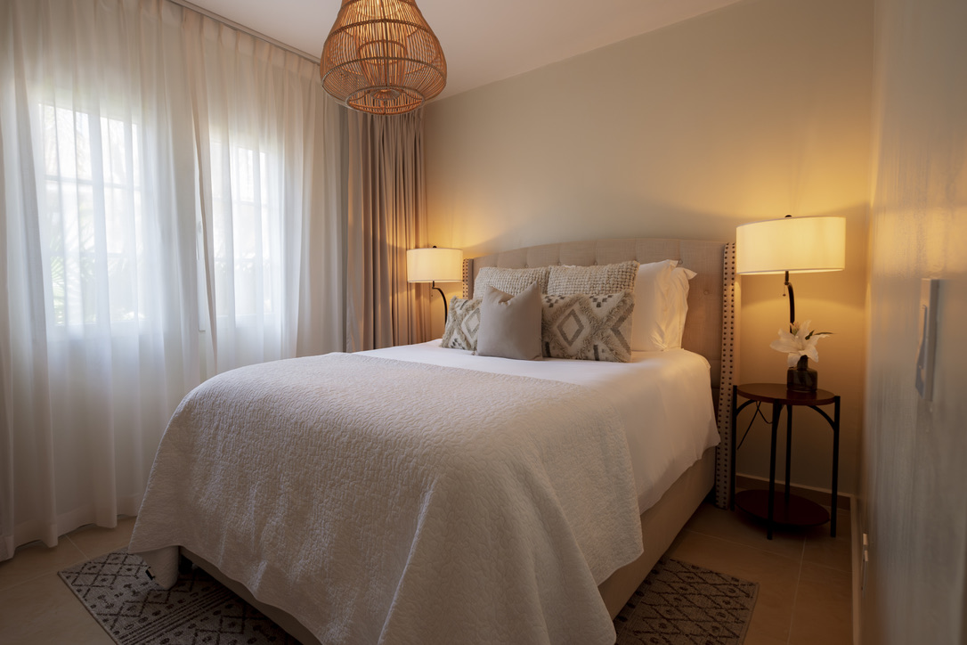 Second bedroom beside the sunlit window at Castaway Beach