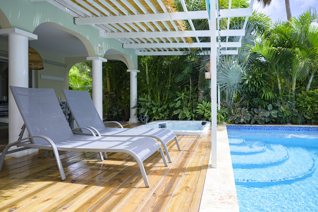 Loungers, hot tub and pool