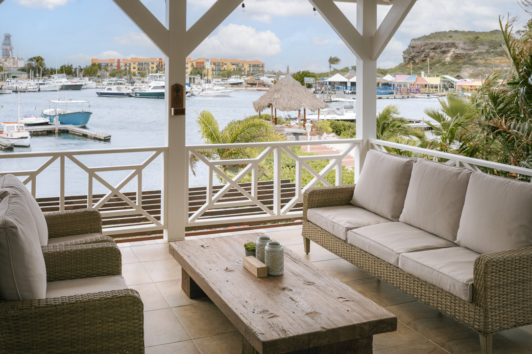 Wide marina view from the covered Sunshine Bay porch