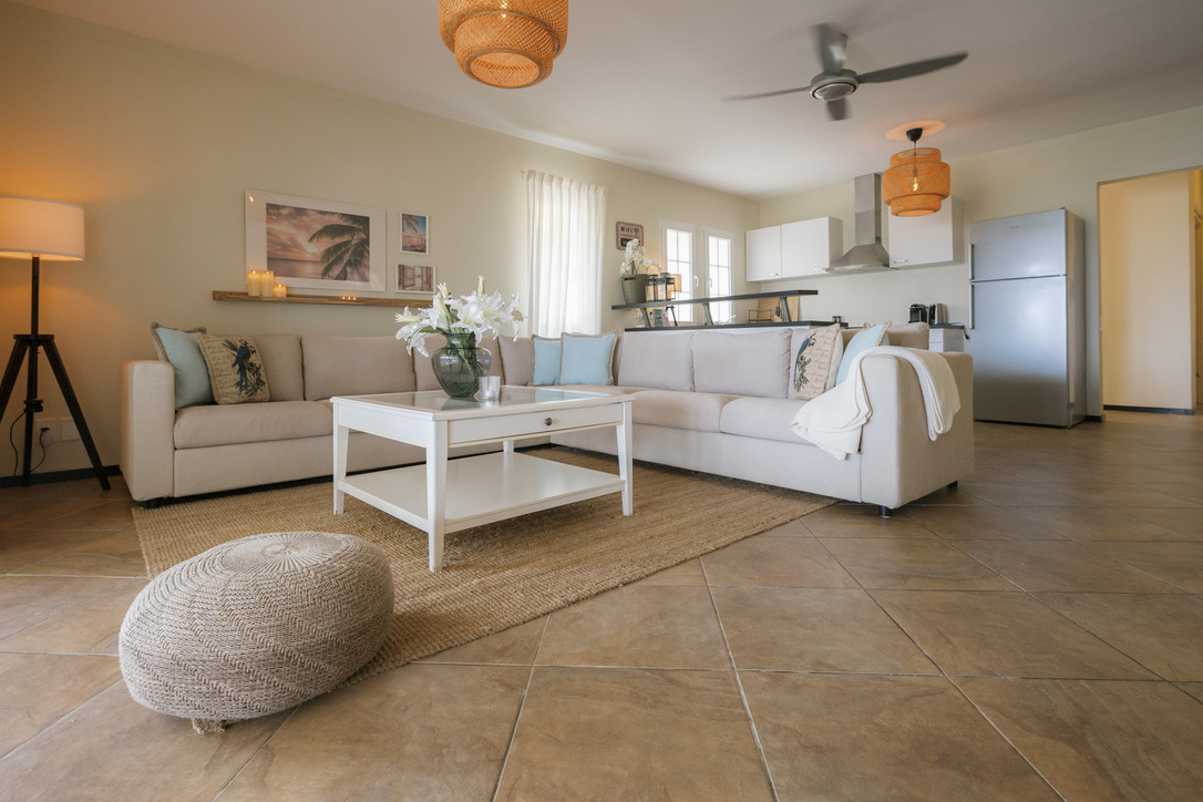 Open living room and kitchen at Tropical Haven